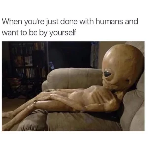done with humans alien on couch.webp