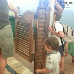 1442248449_kid_gets_hit_by_swinging_doors.gif