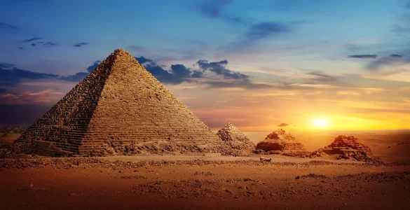 bigstock-egyptian-pyramids-in-sand-dese-265254931.webp