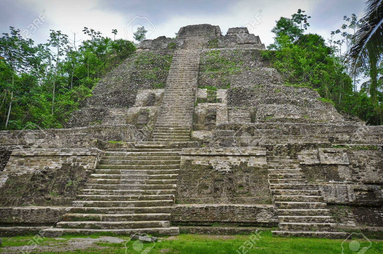 6059603-Mayan-Temple-Deep-in-the-Central-America-Rain-Forest-Stock-Photo.jpg