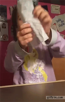 little-girl-performs-magic-trick.gif