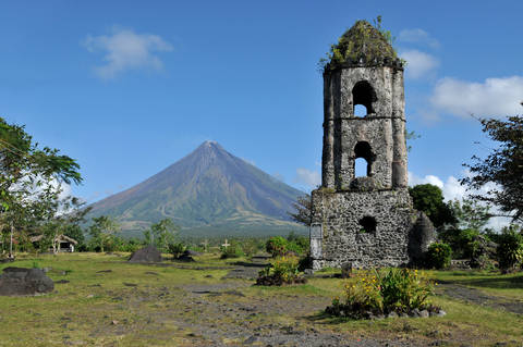 Mount-Mayon-Volcano-and--Ruins-of-Cagsaua-Church-in-Albay-Bicol-Philippines.jpg